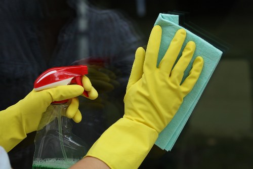 Carpet cleaning team sorting recyclable packaging in Seven Sisters