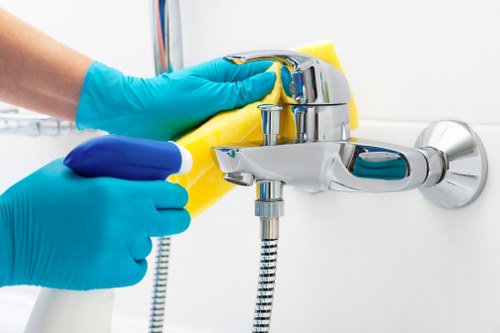 Professional carpet cleaning team preparing equipment for a booked service