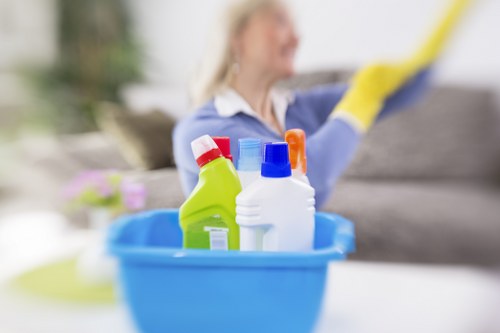 Cleaning team assessing hazards before starting carpet cleaning work